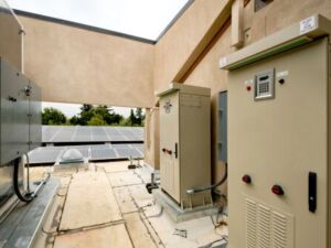 Electrical Inverters and Solar Panels on a rooftop.Click on any of the thumbnails below to see more images in my HVAC lightbox.